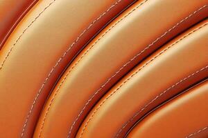 Textured orange leather pattern with curved lines and stitches photo