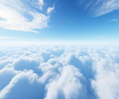 Sky covered with fluffy clouds over a bright blue horizon photo