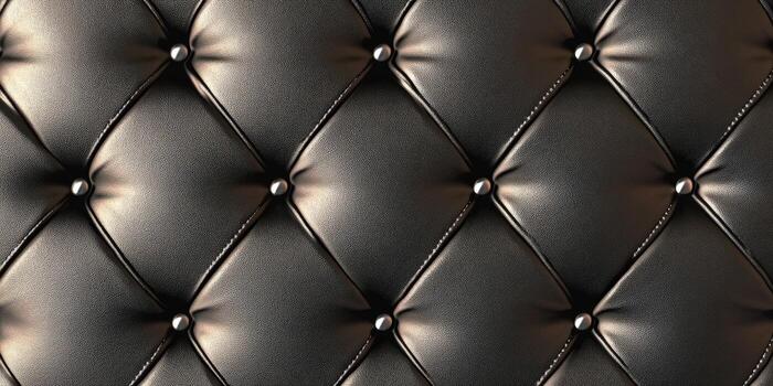Black tufted leather upholstery with rounded buttons pattern photo