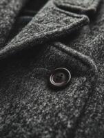 A close up of a button on a coat photo