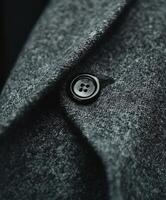 A close up of a button on a jacket photo