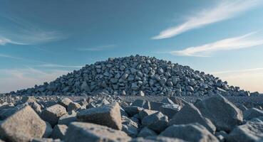 A pile of rocks in the middle of a field photo