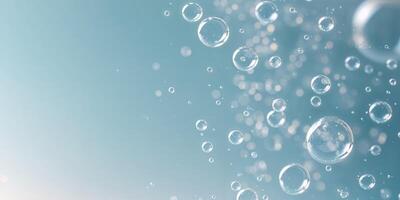 Molecular structure of water revealed in light blue background displaying interconnected bubbles and clarity. photo