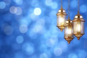 Three ornate lanterns glowing against a soft blue background. photo