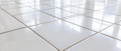 Gleaming white tile floor, indoor setting, bright light reflection, home interior design photo