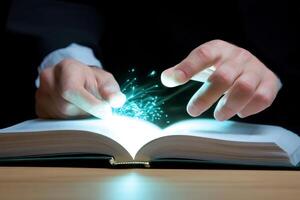 A person is holding a book with glowing sparks coming out of it photo