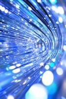 Blue fiber optic swirl, light bokeh, abstract technology background, website header photo
