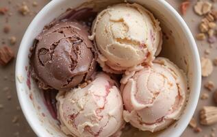 Three scoops of ice cream in a bowl photo
