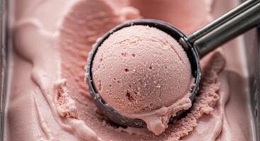 A scoop of ice cream with pink ice cream photo