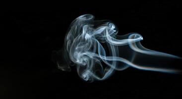 A close up of smoke on a black background photo