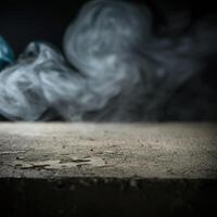 A blue smoke ball is sitting on a concrete floor photo