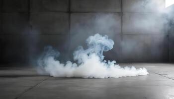 A white smoke is coming out of a concrete wall photo