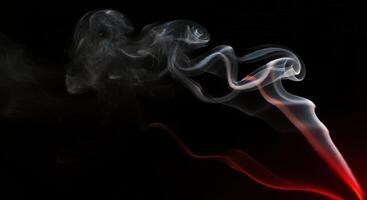 A red and black background with smoke photo
