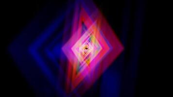 A colorful light is seen in the dark video