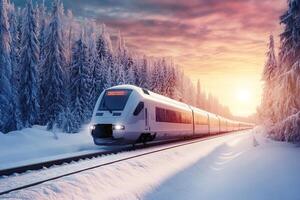 Modern high-speed train traveling through snowy winter wonderland photo