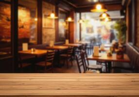 Wooden table top in restaurant with blurred background photo
