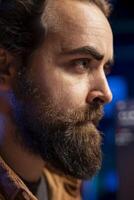 Freelancing software developer securing company servers from virus attacks to avoid unwanted failures. IT remote worker writing code to build firewalls protecting data from risks, close up on face photo
