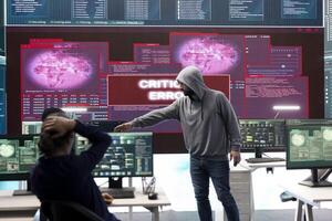 Hackers group failing to hack a system in high tech agency office, reading critical error message on big screen. Specialists trying to steal important database information from rival states. photo