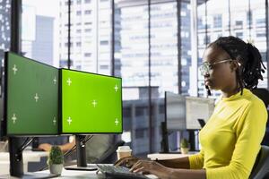 Woman working with machine learning tech on isolated screen computer, advancing AI innovating autonomous systems. IT expert in office transforming data into predictive models using chroma key PC photo