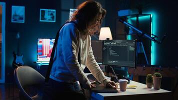 Developer holding disposable cup of coffee entering office to implement security measures, protecting company systems and data. IT worker starting job shift, testing and debugging code, camera B photo