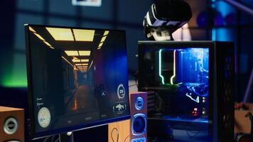 RGB lights illuminated fans on gaming computer capable of playing latest games, close up shot, empty apartment. Focus of components on powerful desktop PC in home living room photo