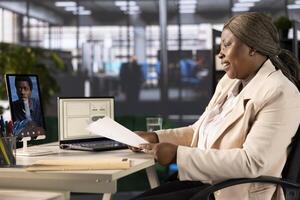 Cheerful friendly interviewer holding teleconference meeting with job candidate, asking questions. Jolly company human resources employee interviewing man for open position photo