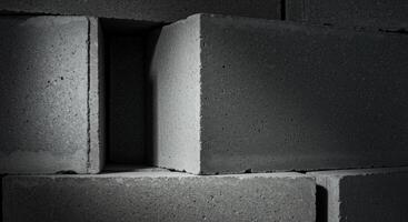 Abstract Grey Concrete Blocks Stacked in Shadows Play of Light and Texture Building Materials Industrial Photography photo