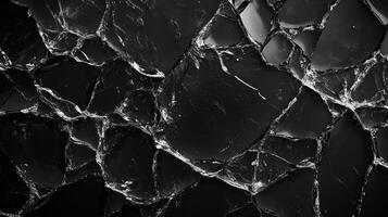 Broken glass surface isolated on black background. 9 photo