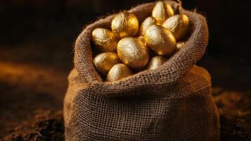 A burlap sack filled with golden chocolate eggs. 4 photo