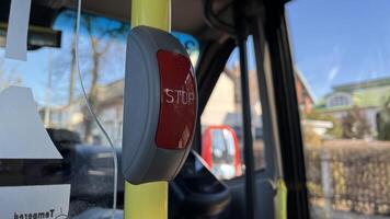 Kaunas, Lithuania. Feb 23, 2025. Bus Stop Request Button Interior Bus View. the Everyday experience of public transportation and the simple mechanisms used by passengers concept photo