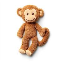 photo huggable plush monkey with a long tail and a playful embroidered face isolated on a white background