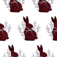 seamless pattern with chocolate Easter bunnies sitting on their hind legs and turned to the side with willow branches with gray ribbons, for Easter decorations vector