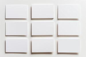 Nine blank business cards are displayed in a grid format on a white background, offering a clean, professional canvas for personalized designs and contact information photo