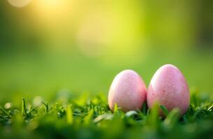 Pink Easter eggs hidden in green grass, natural and festive spring setting photo