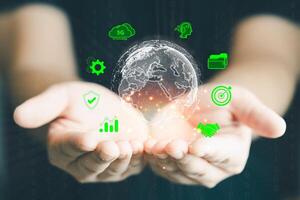 Two hand holding a virtual global. Business global internet connection application technology and digital marketing photo