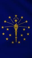 Vertical, portrait, waving national flag of Indiana. Smooth animation with highly detailed, realistic animated background for social media, screens smartphone. Official colors, cloth motion. video
