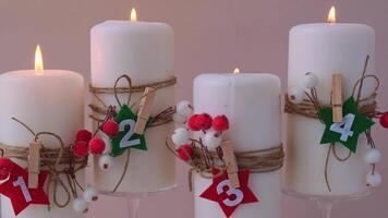 Traditional four advent weeks calendar before Christmas holidays. Candles and plastic free zero waste sustainable decoration. Copy space greeting card mock up template. Winter cozy home time video