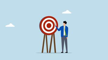 Specific goal, 4k animation of businessman pointing at center of bullseye archery target. video