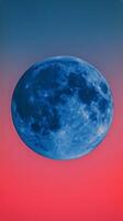 Bright Blue Moon Illuminating the Twilight Sky During the Night photo