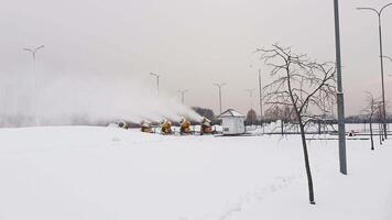 Footage of the industrial machinery so called snow gun or snow cannon that produces artificial snow in action video