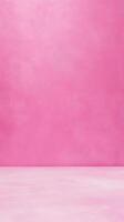 Solid pink textured wall and floor creates a simple yet vibrant backdrop for showcasing products. photo