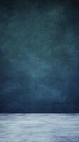 Textured studio backdrop featuring a gradient from dark blue to light blue gray for photography photo