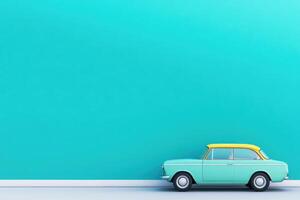 A vintage-style teal and yellow car parks against a matching solid teal wall in a studio setting photo