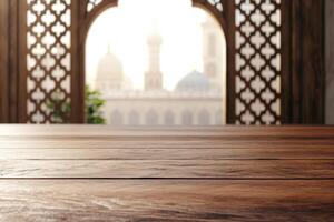 A serene view of a distant mosque through an ornate archway, highlighting wooden surface photo