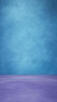 Empty studio scene with blue textured wall and purple floor creates a simple, abstract background photo