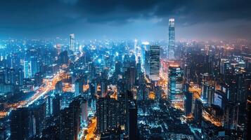 High-rise cityscape illuminated by cool blue lights at night photo