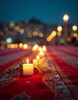 A beautiful close-up of an Eid prayer mat with intricate patterns, surrounded by candles and fresh flowers, creating a serene spiritual atmosphere. photo