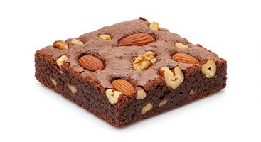 A brownie with nuts and almonds on top photo
