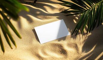 Paper sheet mocap banner with copy space on sand texture sun beach and palm branch shadow. photo