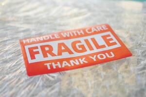 Careful handling required for fragile package during delivery photo